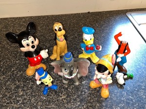 lot 12 image: Collection of 8 Vintage Walt Disney Character Figurines