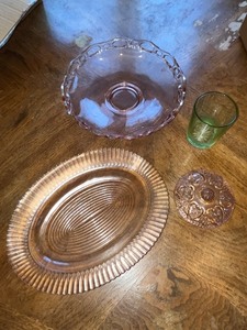 lot 17 image: Vintage Glassware Collection Including Pink Depression Glass Plates and Green Bakeware