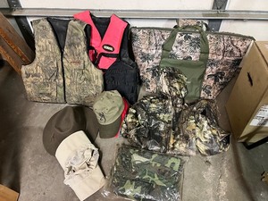 lot 28G image: Assorted Hunting Gear Collection with Vests, Caps, Camo Jacket, and Carry Bags