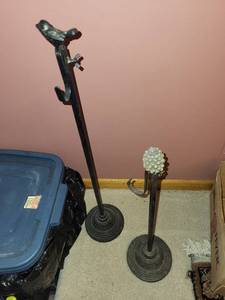lot 92 image: Pair of Decorative Metal Floor Standing Holders with Bird and Pinecone Accents
