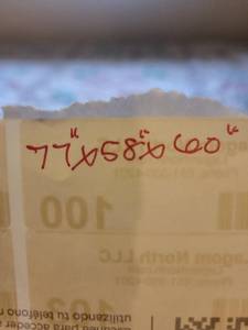 lot 100 image: White Metal Twin over Full Bunk Bed with Mattresses 77x58x60 Inches