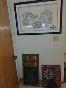 lot 102 image: Halex Nova 1.0 Electronic Dartboard with Soft Tip Darts and Bar Decor Bundle