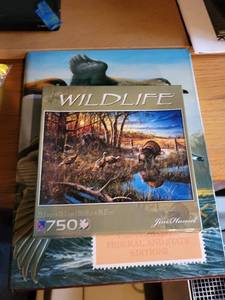 lot 126 image: Wildlife 750 Piece Jigsaw Puzzle and Duck Stamps and Prints Book Set