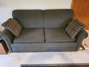 lot 130 image: Pull-Out Sofa Bed with Plaid Accent Pillows