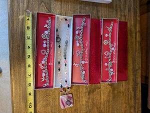 lot 18U image: Set of 3 7.5 Inch Pink Charm Bracelets and Beaded Necklace