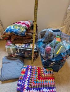lot 27U image: Large Lot of Handmade Crochet Blankets and Yarn Assortment