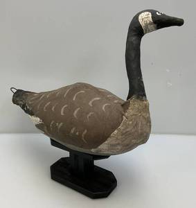 lot 16 image: 1930s - 1940s Straw Stuffed Canvas Goose Decoy On Wooden Stand
