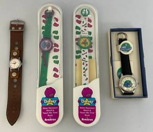 lot 40 image: Misc. Vintage Watches Including Mickey Mouse, Barney And More (Three In Original Packaging)