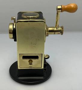 lot 43 image: Vintage Gold Tone El Casco Eibar Espana M-430 Pencil Sharpener With Magnifying Window And Shutter Style Pencil Entry 6