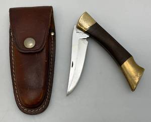 lot 52 image: Vintage Browning Lock Blade Knife With Leather Sheath