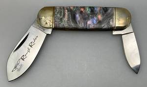 lot 75 image: Vintage Rough Rider Double Blade Pocket Knife With Multi Colored Pearl Handle 2 & 3 Blades