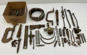 lot 86 image: Misc. Vintage Metal Items Including Brass Pipe Holders, Metal Hatchet Head And more