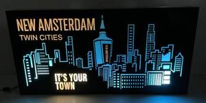 lot 93 image: Vintage Acrylic New Amsterdam Twin Cities Light Up Advertisement Sign 16 x 32 x 3 12 (WORKS)