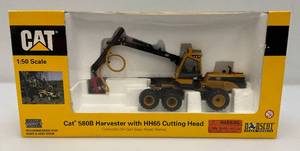 lot 105 image: NORSCOT 150 Scale Die Cast Cat 580B Harvester With HH65 Cutting Head (NIB)