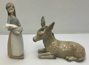 lot 116 image: Vintage NAO Lladro Spain Donkey #310  Five Inch  And Lladro 1970s Girl With Piglet Retired 7 Porcelain Figurines