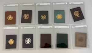 lot 124 image: Antique 1910 Leather Tobacco Collectible State Seal Cards (In Protective Sleeves)