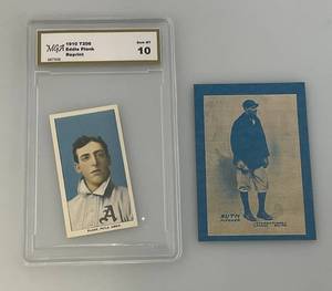 lot 127 image: REPRINT  Early 1900s Cigarette Cards Including 1914 Balt. News Rookie Card Reproduction And Eddie Plank MGA Graded Gem Mint 10 (Both In Protective Sleeves)