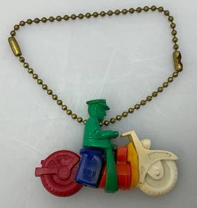 lot 172 image: RARE Vintage Multi Colored Plastic Motorcycle Cop Puzzle Keychain USA