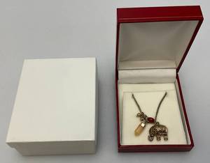 lot 209 image: Gold Tone  25 Necklace With Elephant Pendant (New With Box And Gift Box)