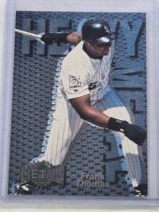 lot 34 image: Frank Thomas 1996 Metal Universe Heavy Metal Insert #8 - Chicago White Sox Baseball Card