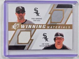 lot 16 image: Paul Konerko, Jim Thome 2009 Upper Deck SPx Winning Materials Dual Relic #WM2-KT - Chicago White Sox Baseball Card