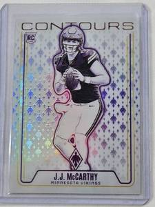 lot 77 image: J.J. McCarthy Rookie 2024 Panini Phoenix Contours Refractor #CON-JMY - Minnesota Vikings Football Card