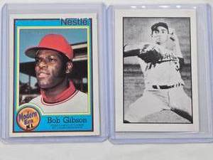 lot 115 image: Lot of 2 Baseball Cards Featuring Bob Gibson 1987 Nestle Topps #31 and Sandy Koufax RGI Baseball Collector Series #3