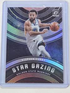lot 204 image: Stephen Curry 2022-23 Panini Donruss Optic Star Gazing Silver Prizm #10 - Golden State Warriors Basketball Card