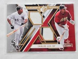 lot 230 image: Carlos Lee 2009 Upper Deck SPX Flashback Fabrics Dual Relic #FF-CL - Chicago White Sox and Houston Astros Baseball Card