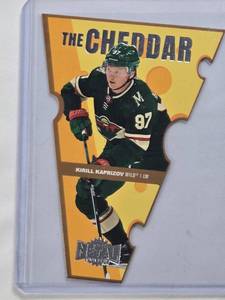 lot 240 image: Kirill Kaprizov 2021-22 SkyBox Metal Universe The Cheddar Die-Cut #TC-7 - Minnesota Wild Hockey Card