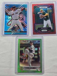 lot 281 image: Lot of 3 Numbered Refractros Max Muncy Panini Prizm 275299, Trevor Story Topps Finest 97150, and Sonny Gray Topps Chrome 5175