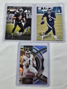 lot 328 image: Lot of 3 Jalen Hurts Football Cards including Panini Luminance Rookie and Select Prizm