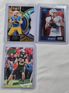 lot 337 image: Lot of 3 Justin Herbert Football Cards Including Rookie and Refractor