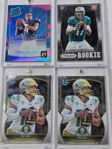 lot 377 image: Lot of 4 NFL Rookie Cards in Magnetic One Touches Featuring Ryan Tannehill, Bo Nix, and Deshaun Watson with Rookie and Bowman Briefing Features