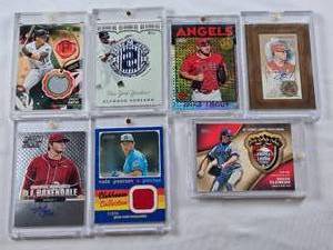 lot 382 image: Lot of 7 Baseball Cards in Magnetic and Screw Down One Touch Cases Featuring Alfonso Soriano, Mike Trout, and Roger Clemens with Autographs and Relics.