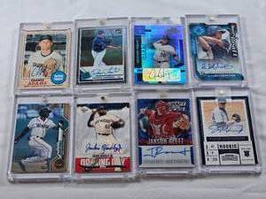 lot 384 image: Lot of 8 Baseball Cards in Magnetic One Touches with Chance Adams, Dennis Santana, Blake Rutherford, Julio Pablo Martinez, Jackie Bradley Jr., Jason Jennings, Jordon Montgomery, and Jakson Reetz. Including Rookies and Autos
