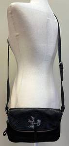 lot 7 image: Marc by Marc Jacobs Black Leather Crossbody Bag with Silver Bird Accent