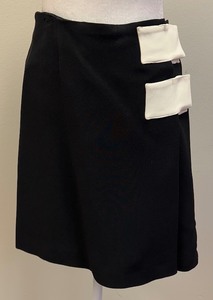 lot 12 image: Moschino Cheap and Chic Black Skirt with White Accent Tabs, Size 8