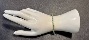 lot 8JM image: 14k Gold Emerald and Diamond Tennis Bracelet 7.5 Inch