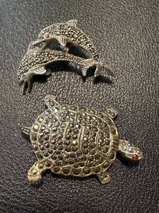 lot 48NP image: Pair of Sterling Silver Marcasite Dolphin and Turtle Brooches 1.5 Inch