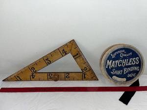 lot 27 image: Vintage Measuring Triangle & Matchless Skirt Binding Roll