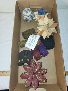 lot 41 image: Lot of Handmade Fabric Pincushions, Patchwork Stars & Knitted Bear