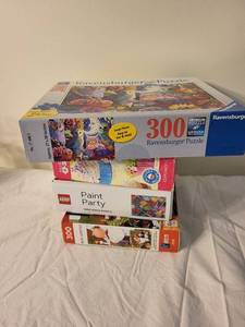 lot 94 image: Ravensburger, Eurographics & LEGO Puzzle Lot - 4 Boxes