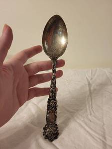lot 181 image: Ornate Vintage Sterling Silver Spoon with Intricate Design