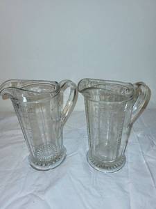 lot 193 image: Pair of Antique Glass Measuring Pitchers with Embossed Measurements