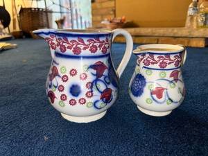 lot 161 image: Vintage Stick Spatter Ironstone Floral Ceramic Pitchers Set of 2