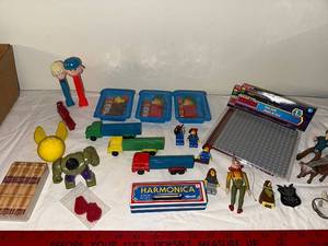 lot 228 image: Mixed Lot of Vintage Toys and Collectibles  PEZ, Action Figures, Trucks