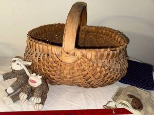 lot 229 image: Woven Basket with Handle and Sock Monkey Lot
