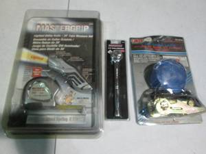 lot 47 image: 2pc tape measure and lighted Utilit...