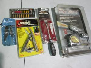 lot 76 image: 2pc measuring tape and light up uti...